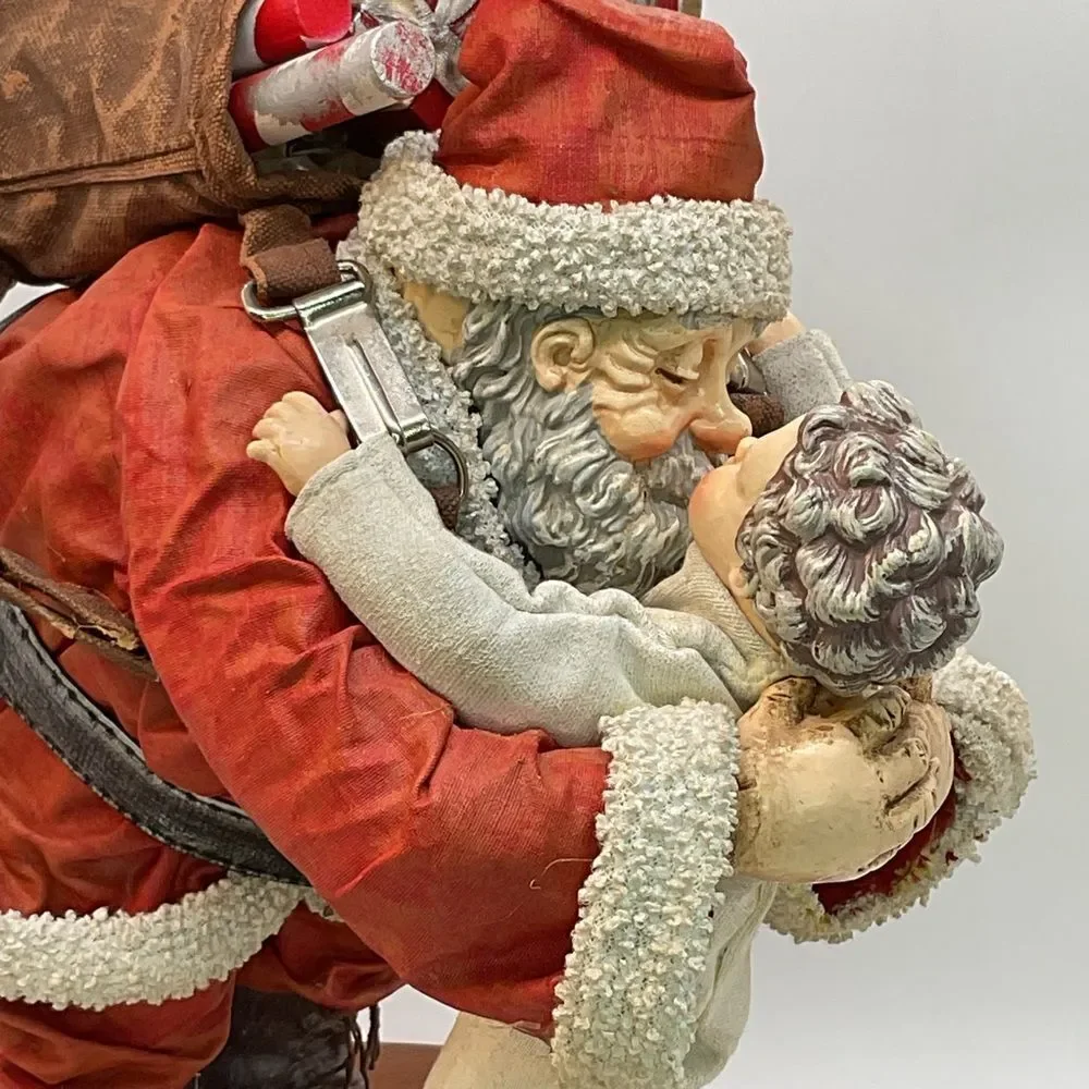 Clothtique Santa and Child Sculpture - Saturday Evening Post
